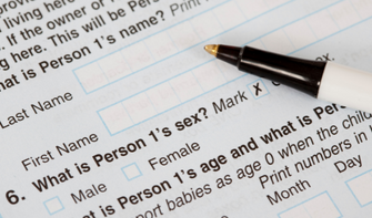 Pen on top of a census form.